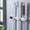 Porte-balai mural auto-adhésif, organisateur d’accessoires salle de bains, cuisine Porte-balai mural auto-adhésif, organisateur d’accessoires salle de bains, cuisine